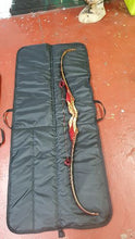 Load image into Gallery viewer, Midwater Bow Bag lay on the floor open with bow laid inside for size comparison