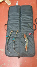 Load image into Gallery viewer, Midwater Bow Bag lay on the floor open with taken down bow laid inside for size comparison on internal pockets
