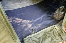 Load image into Gallery viewer, Social Cap with the black Midwater Bivvy Groundsheet in place.