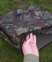 Load image into Gallery viewer, Hand demonstrating the opening of the Midwater Chair Tidy in DPM camo
