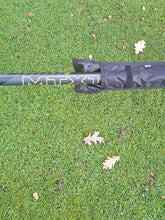 Load image into Gallery viewer, Midwater Pole Sleeve in black colour on the grass with a recognisable branded pole in position to demonstrate size comparison