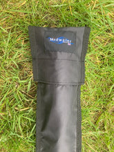 Load image into Gallery viewer, Midwater Pole Sleeve on the grass showing the top flap fastening.