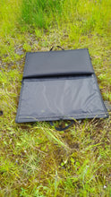 Load image into Gallery viewer, Midwater Range Mat in black partially open on the grass